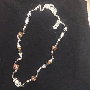 Warm tones costume necklace .... looking so rich on a black top